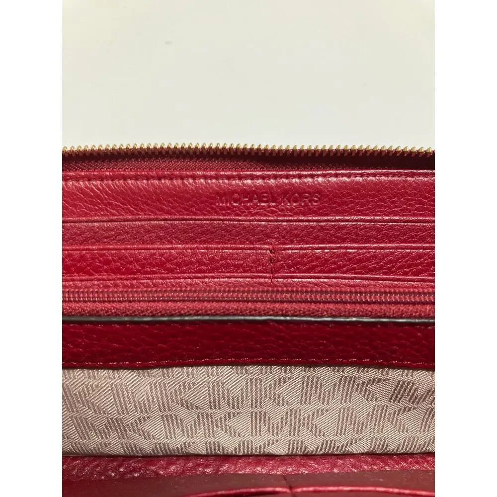 MICHAEL KORS, LARGE RED PEBBLED LEATHER WALLET